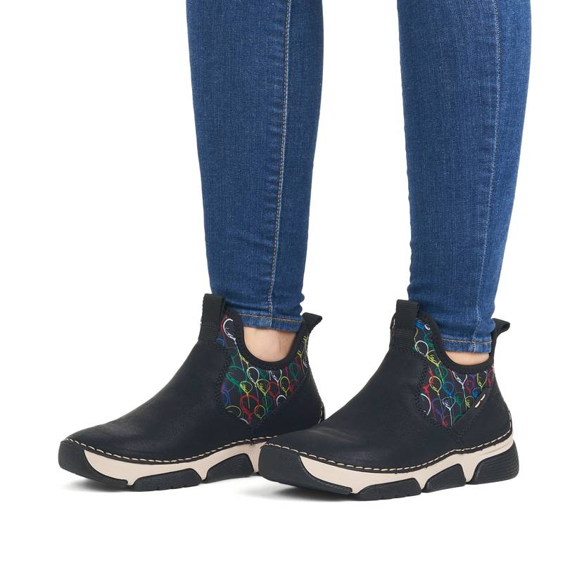 Rieker Artikelnummer 45957-00 Rieker Damen Slipper urbanschwarz-bunt Bis zu 50% Rabatt